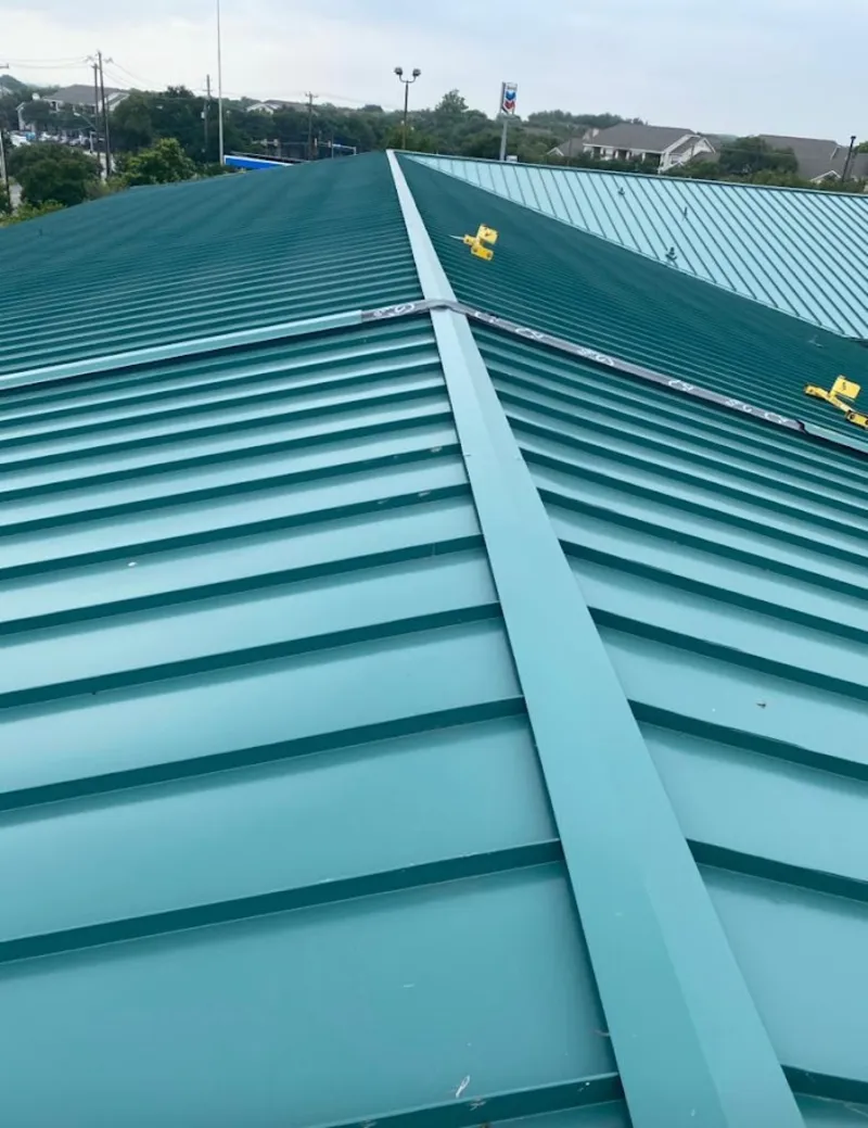 Green commercial metal roof ridge and valley for Metal Roof Repair in Lake Charles